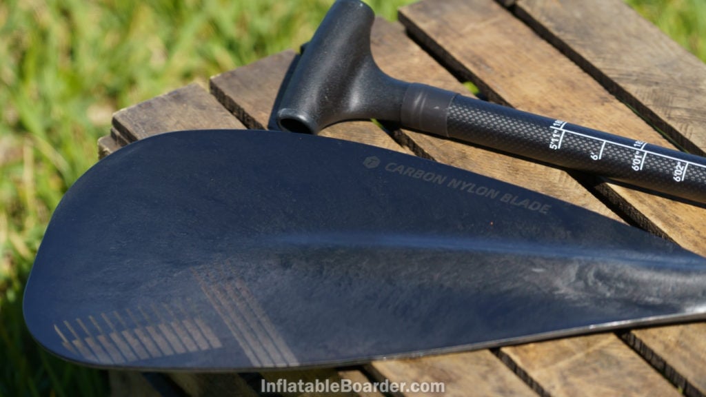The paddle blade is carbon nylon. The handle is ergonomically shapped and rubberized.