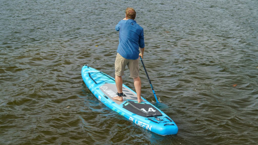 Paddling the board straight away on a lake to demonstrate tracking performance.