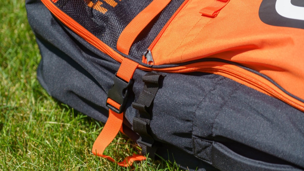 Detail of the compression strap and cargo looks.