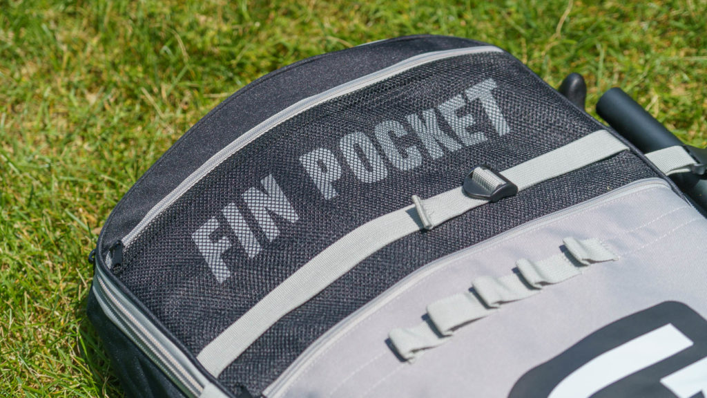 Mesh fin pocket at the top of the bag.