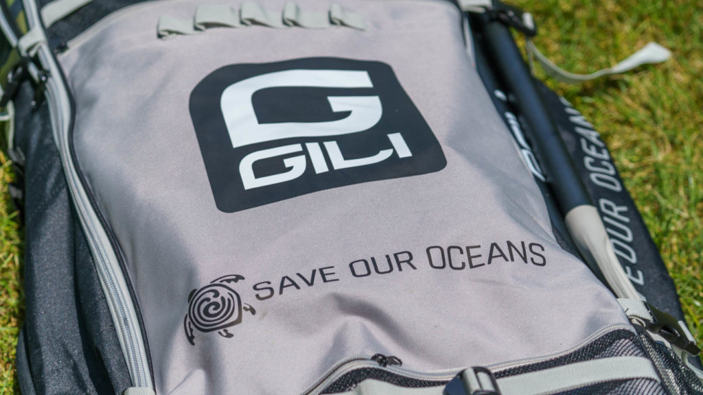 Gili and Save Our Oceans branding on the front of the bag.