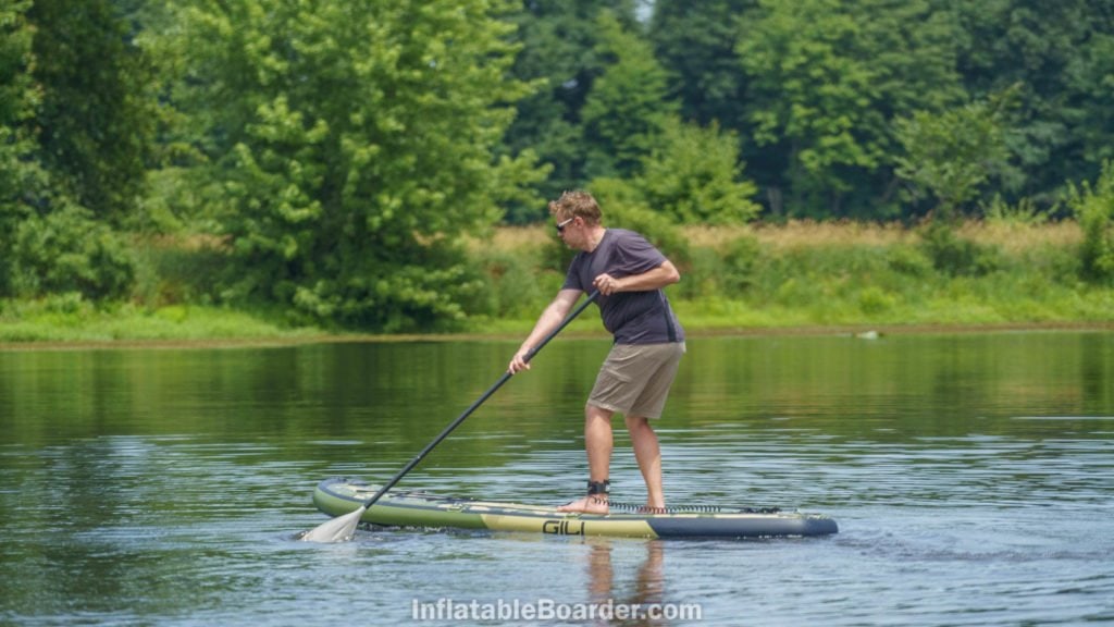 Turning the paddle board on water.