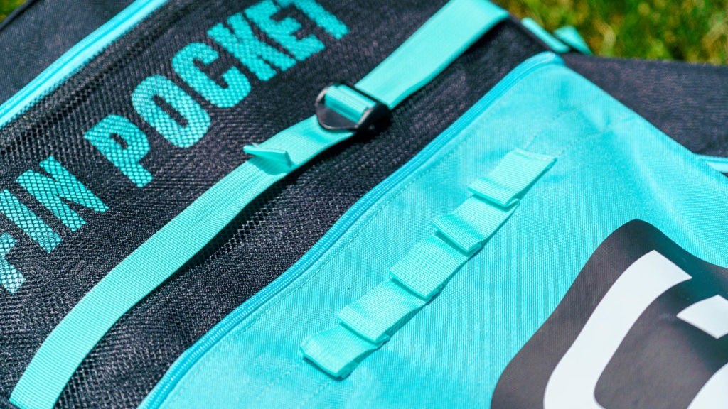 Detail of the cargo loops on the front of the bag.