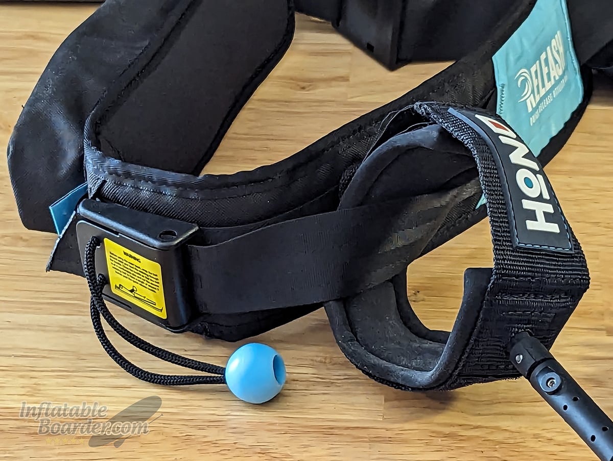 A standard leash attached to a quick release belt.