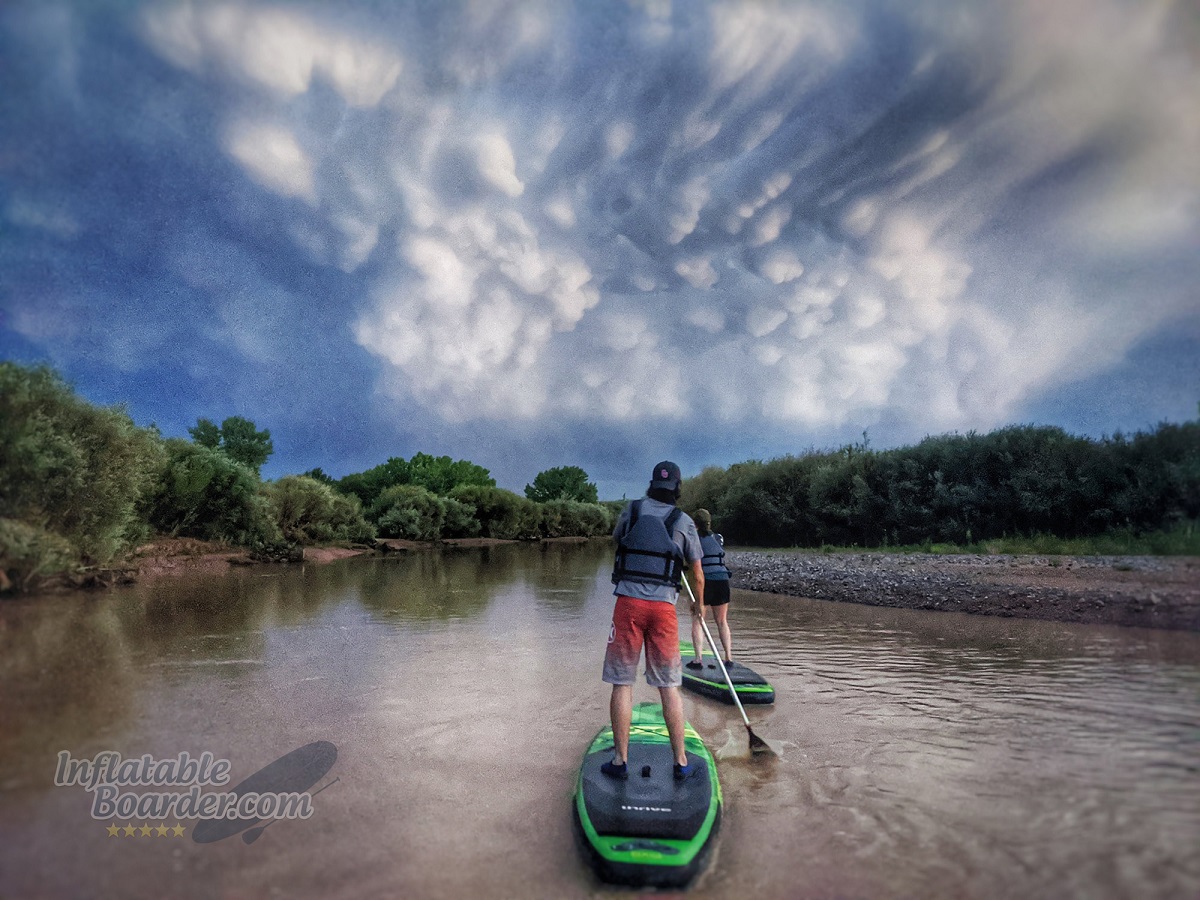 large clouds overhead while paddling